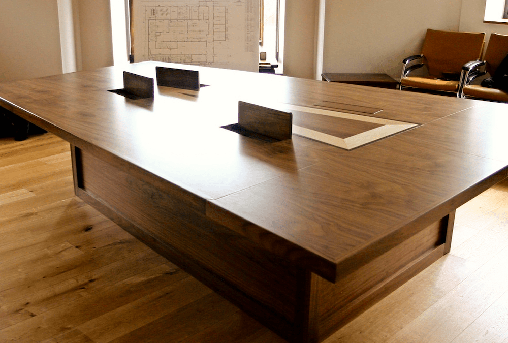 Bespoke boardroom table for Glenhaven foods from solid walnut with maple and wenge rosewood inlay